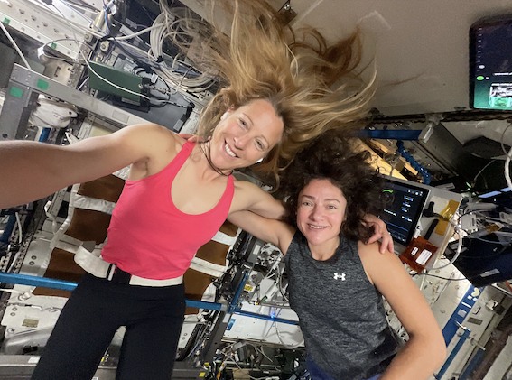 Expedition 74 Flight Engineers (from left) Sophie Adenot of ESA (European Space Agency) and Jessica Meir of NASA take a portrait together before beginning their exercise sessions.