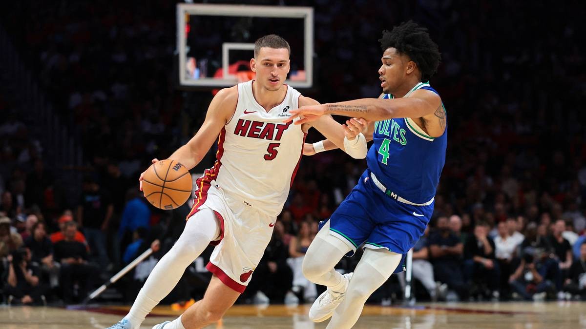Nikola Jovic drives against Terrence Shannon Jr. during the third quarter, October 21, 2026.
